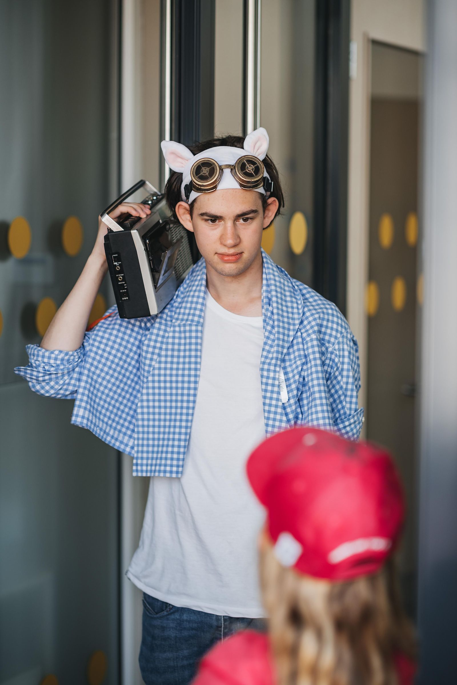 A teen camper in a creative studio session at Exupery Camp