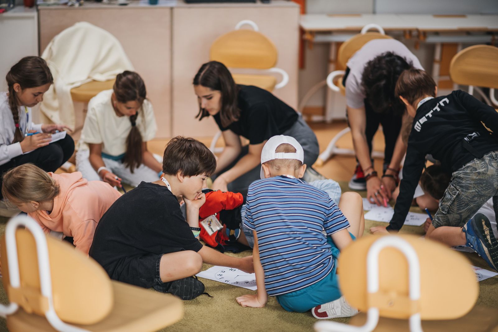 Junior campers working on a group project at Exupery Camp