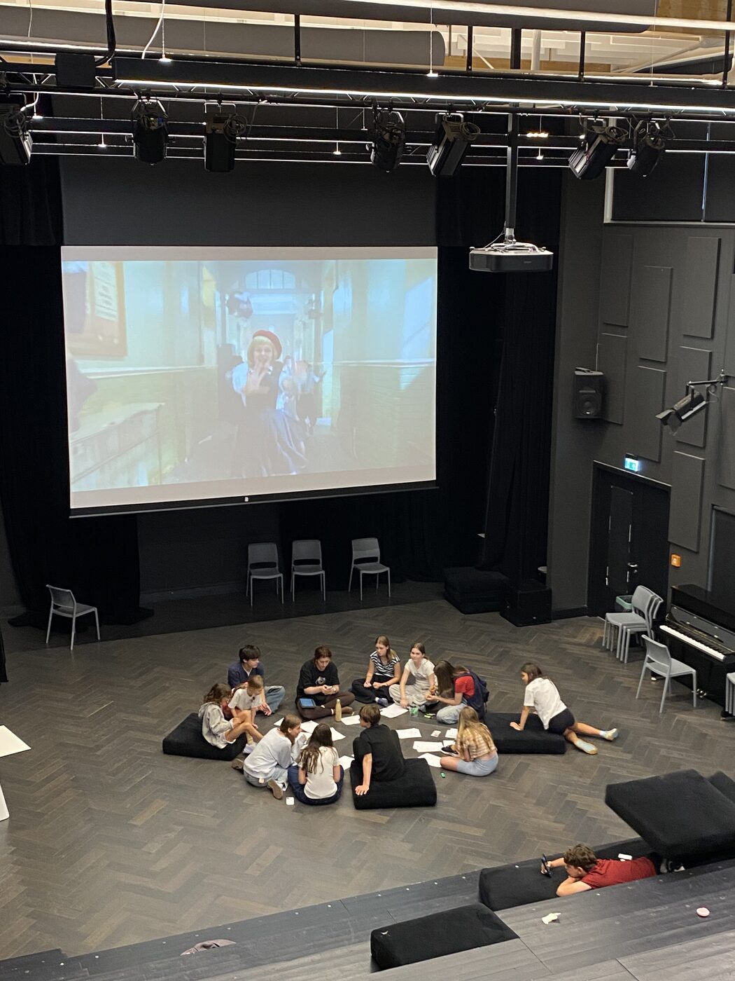 Campers reviewing raw footage together, Cinema Studio, Exupery Camp